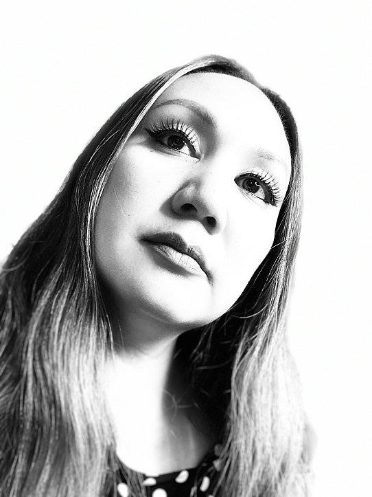 woman wearing low key strip lashes